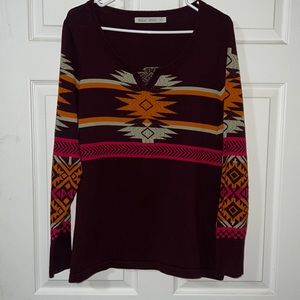 Woman’s size XL woolrich v-neck sweater.